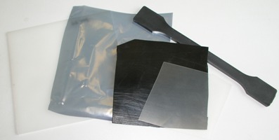 Ovenst�ende foto viser pr�veemner af polymere og kompositmaterialer med forskellig resistivitet