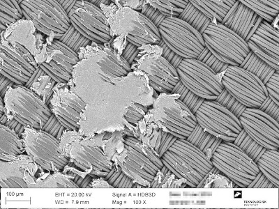 Elektronmikroskop billede af afsmitning p en fiberklud