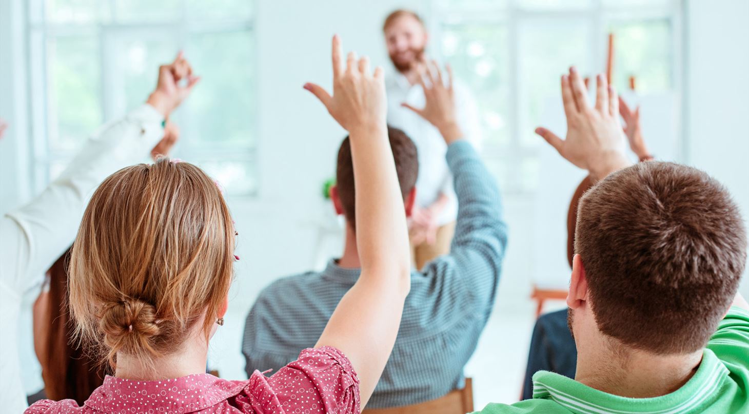 Speaker educating audience