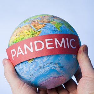 Jordklode med pandemi skilt